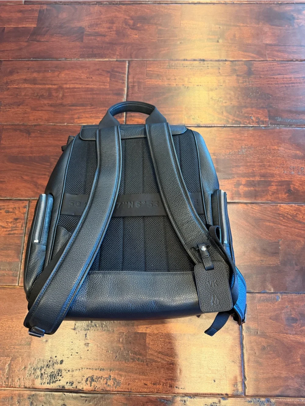 RIMOWA Black Leather Men's Backpack with Front Flap, used only once.
